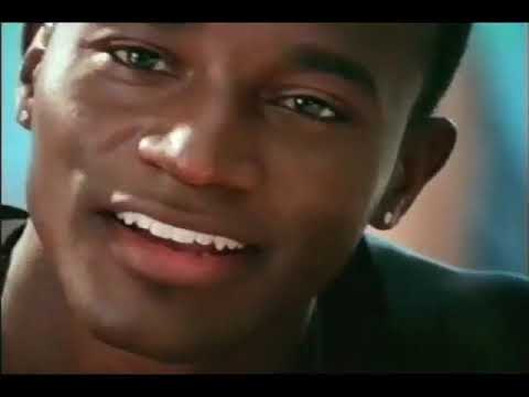 1998 trailer frame: Stella and Winston on the Jamaican coast, hinting at the film’s R&B and reggae-led soundtrack