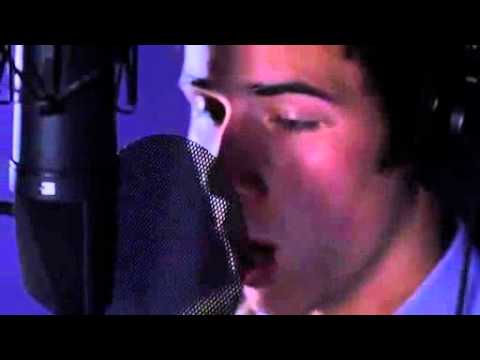 Nick Jonas singing Empty Chairs in a Studio