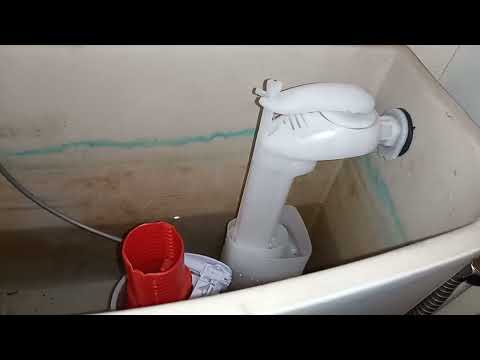Part of a video titled REGLAGE FLOTTEUR CHASSE D'EAU WC - YouTube