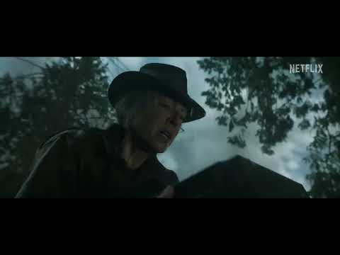 Lou trailer frame of Allison Janney and Jurnee Smollett moving through the woods