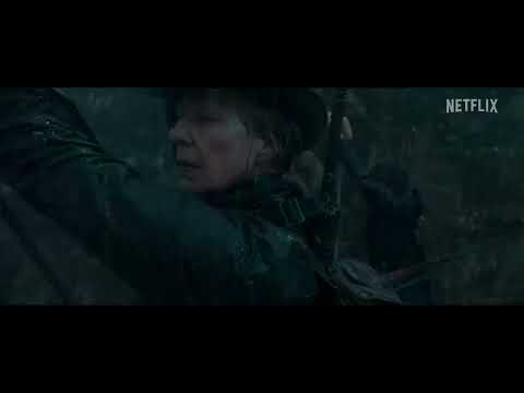 Lou trailer still of stormy beach confrontation