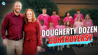 Are any of the Dougherty Dozen kids biological How many kids did the Dougherty dozen adopted