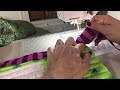 How to fold the corners when binding a quilt.