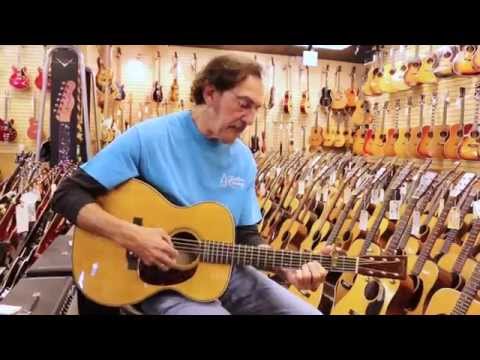 Freebo playing a Martin 000-28 here at Norman's Rare Guitars