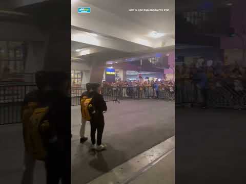 UST Golden Tigresses approach their fans, take a bow and thank them outside MOA Arena