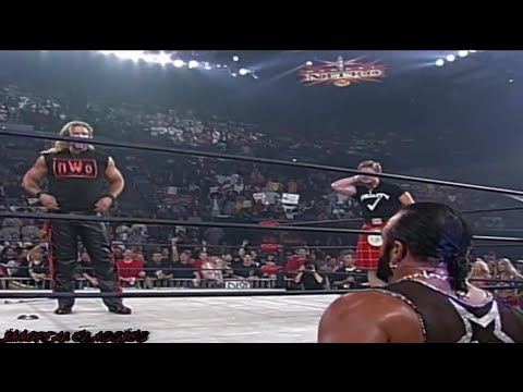 Macho Man Randy Savage confronts Kevin Nash, Rowdy Roddy Piper and Eric Bischoff