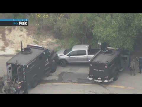Person in fatal UPS driver shooting surrounded by police