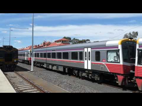 Five Vline Sprinter Rail Cars departing from the middle road at Seymour Station.