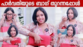  WHATS IN MY BAG  with PARVATHY AYYAPPADAS  GINGER