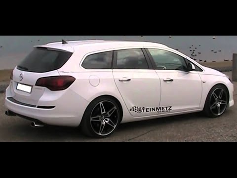 opel astra j sports tourer открытие багажника из салона