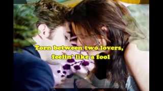 Torn Between Two Lovers with Lyrics