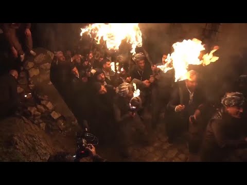Iraqi Kurds celebrate Newroz by carrying torches and fireworks