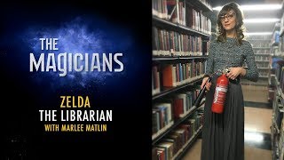 Mageina Tovah as The Librarian in “The Magicians” video