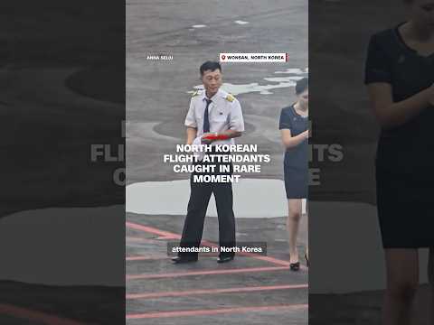 North Korean flight attendants caught in rare moment