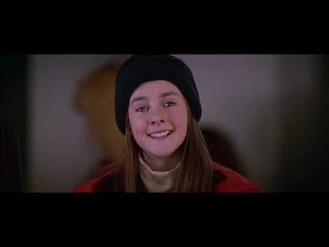 Trailer still: family montage echoing the film’s use of diegetic songs at home