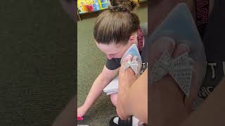 Training a new worker with high heel shoe and bare foot