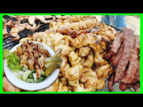 Phnom Penh street food / Pig intestine grilled / Street food at evening.