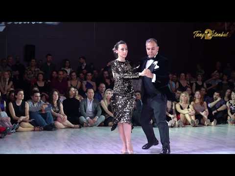  Utku Kuley  and  Iris Basak Dogdu  are  dancing  to  the  tango  "  Loca  "  by  Tango Bardo  at  TanGO TO Istanbul  in  2019