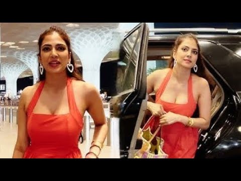 Chocolate Sweet Malavika Mohanan; Spotted At Mumbai Airport in Dark Orange Dress! #malavikamohan