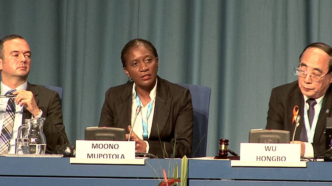 Moono Mupotola speaks at the Fourth ISID Forum