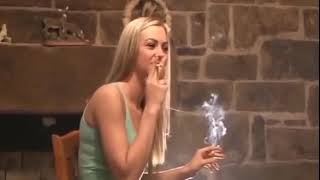 Lisa smoking 2 cigarettes at time