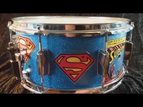 Pearl Export  custom Assaulted Battery two color Superman themed graphics over a blue sparkle wrap. image 8