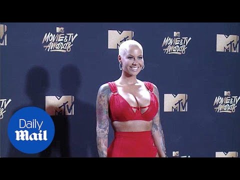 Amber Rose flaunts busty chest at MTV Movie and TV Awards - Daily Mail