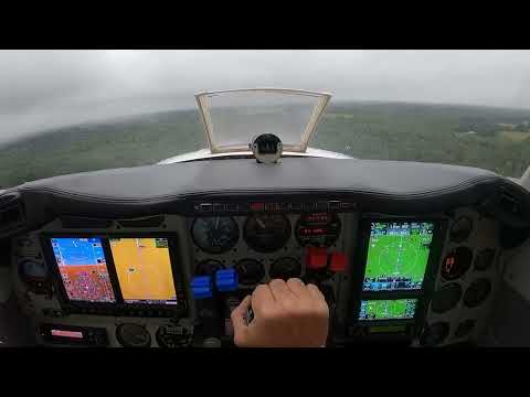Beechcraft Baron 58P on a low RNAV approach landing at an uncontrolled airport