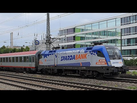 ÖBB-Taurus class 1116 in "Sparda Bank" livery speeds through Munich-Heimeranplatz