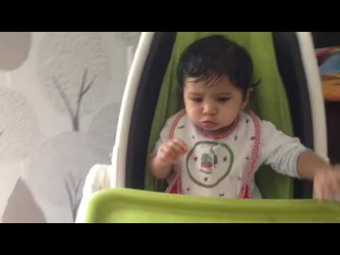 Ashni at 8 months eating watermelon