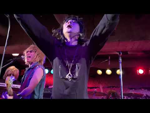 Hozzy Horibourne as Ozzy Osbourne / Crazy Train