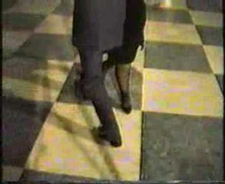  Elvira Vargas  and  Jose Lampaso  are  dancing  to  the  milonga  "  Milonga, Vieja Milonga  "  by  Juan D'Arienzo
