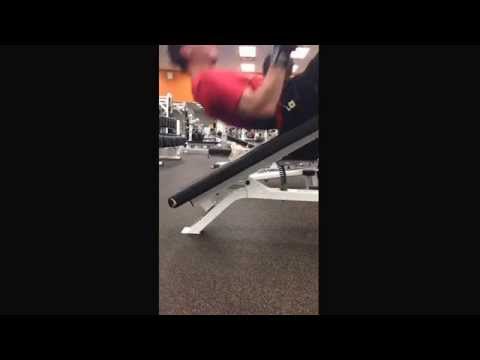 Weighted incline sit-ups