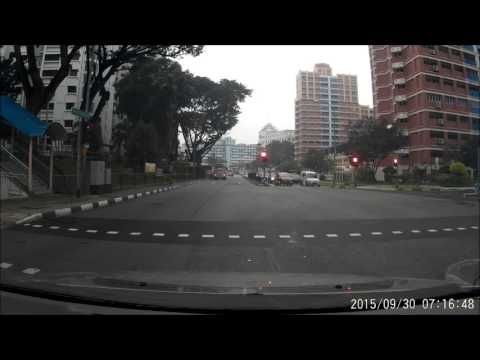 This reckless cyclist beat red light nearly knocked down a young child and old lady.