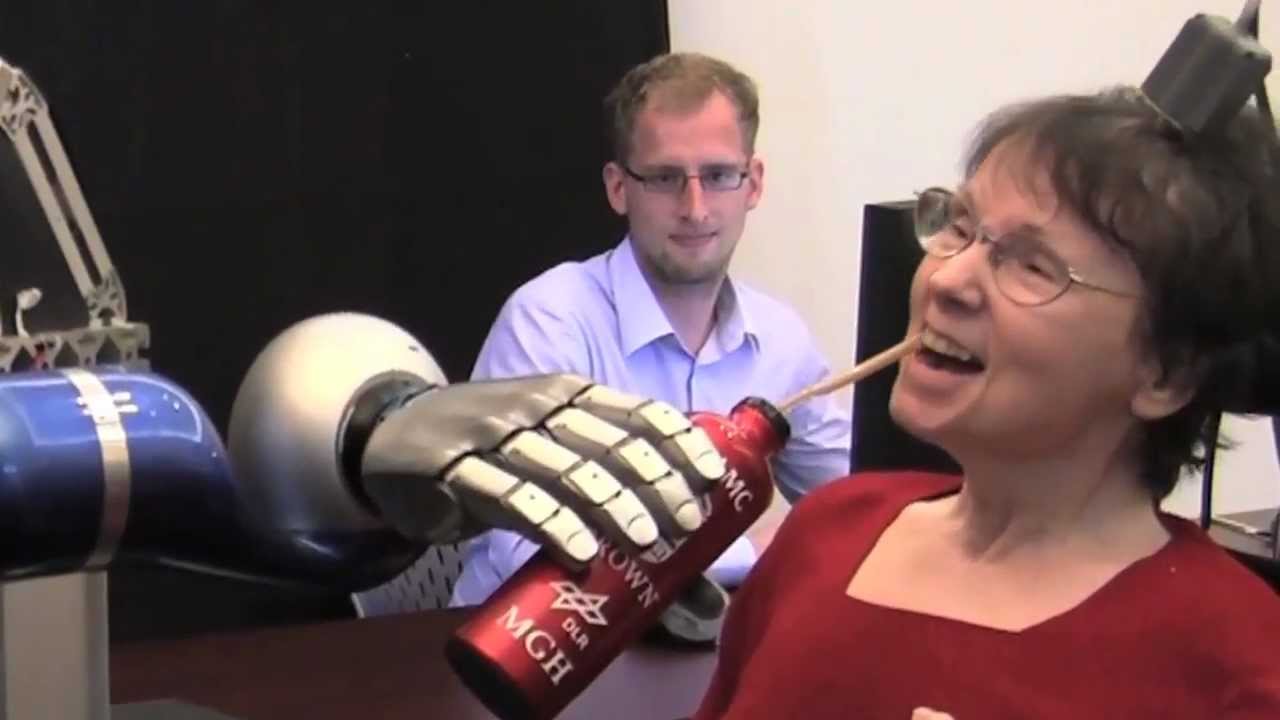 Thought control of robotic arms using the BrainGate system - YouTube