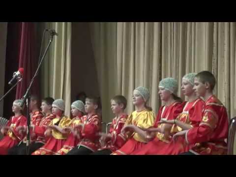Children's musical ensemble  -Playing wooden spoons
