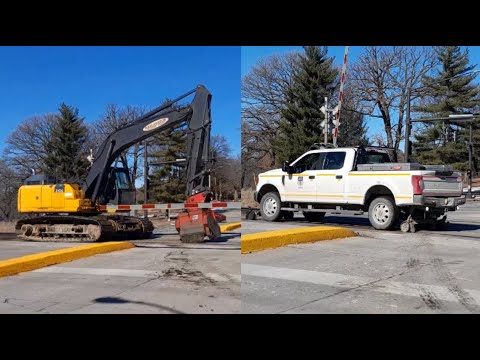 Watch a Hi-Rail Truck and a "Railavator" get on the tracks!