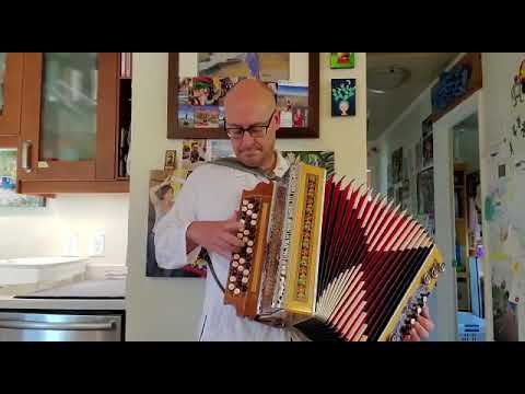 Chalon Rein plays his chromatic one last time before he sold it.