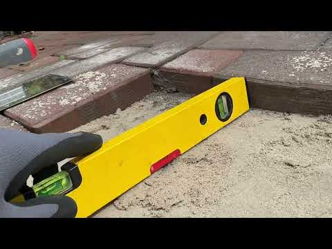 Straightening a paved patio or path (removing stones, filling and grout) Instructions