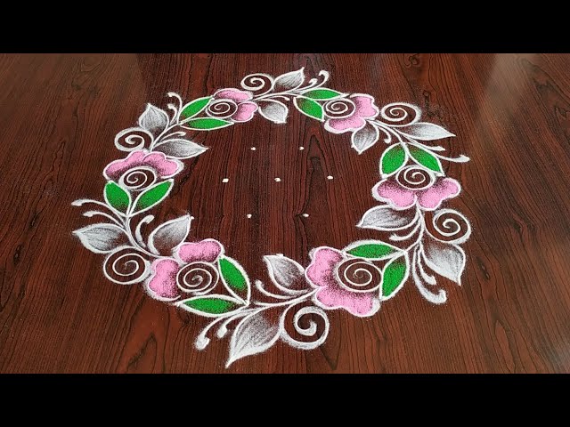 Dotted rangoli design wreath of roses by sresta rangoli