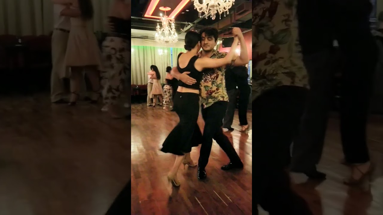 Sakura from Japan and Max Vera from Argentina dancing on dance floor