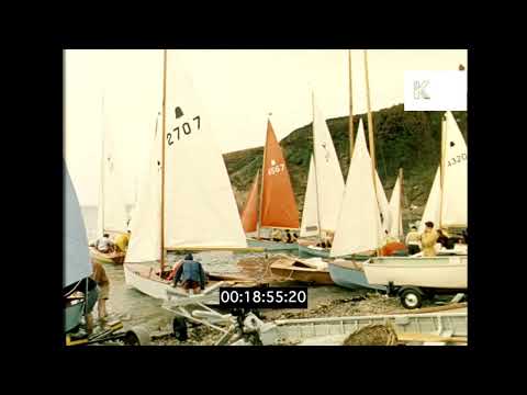 Video: GP14 fleet launch from beach full of holidaymakers - 1960s