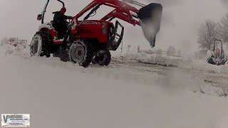 preview picture of video 'Massey Ferguson 1529: Snow Removal Action'