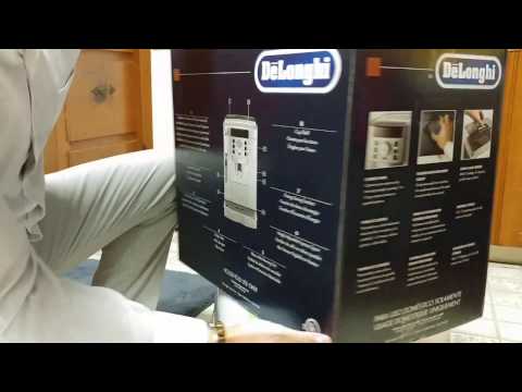 Unboxing Delonghi Magnifica and inspecting item for damages