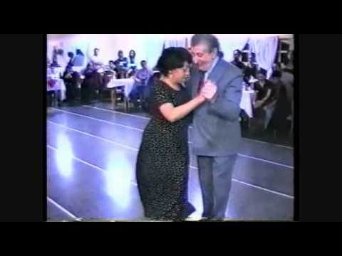  Jose Brahemcha  and  Nelly Acosta  are  dancing  to  the  tango  "  Cachirulo  "