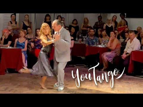  Lorena Ermocida  and  Oscar Martinez Pey  are  dancing  to  the  tango  "  Y Todavia Te Quiero  "  by  Carlos di Sarli  in  2020