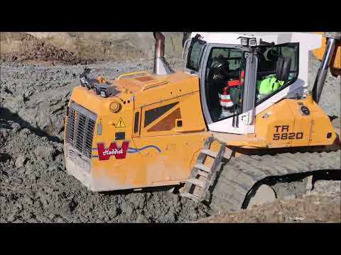 Tracked transporter TR5820 (Liebherr based) working in a clay pit