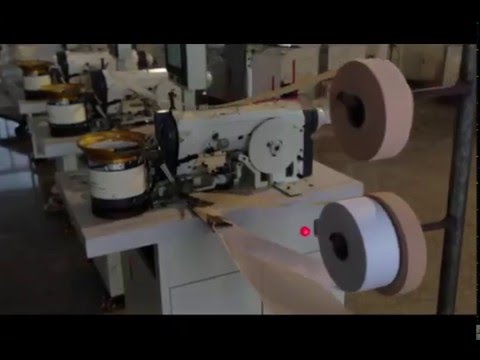 Full automatic continuous hook & eye tape sewing machine
