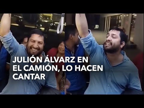 Julión Álvarez on the truck, passengers make him sing