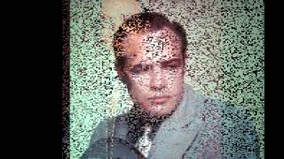 MARLON BRANDO AND JEAN SIMMONS       A WOMAN IN LOVE